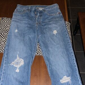 Levi - 501 button fly red tab 27 X 32 please note where tears are. Really cute